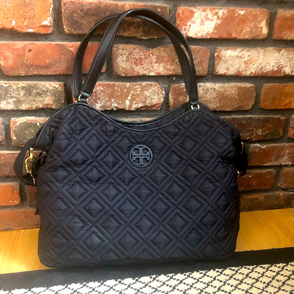 Tory Burch diaper bag with changing pad.